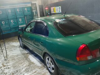 1998 Mitsubishi Carisma I, зелёный, 170000 рублей, вид 4