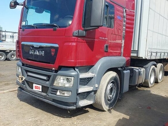 2011 MAN TGS, пурпурный, 2950000 рублей - вид 2