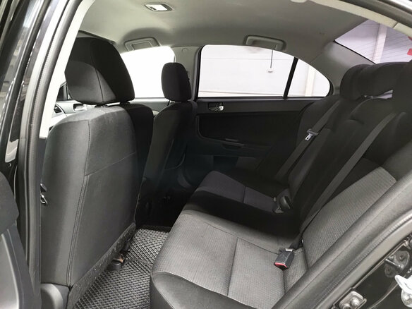 2010 Mitsubishi Lancer X, чёрный - вид 11