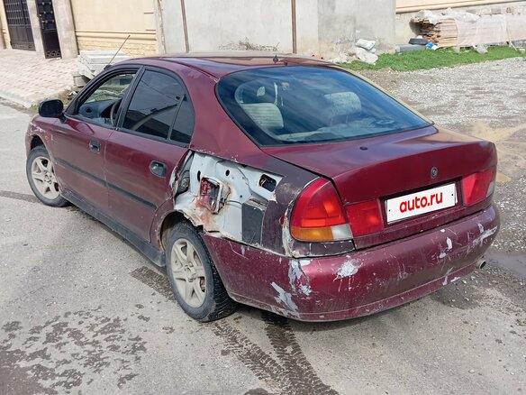 1998 Mitsubishi Carisma I, красный, 89999 рублей - вид 5