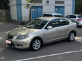 2007 Mazda 3 I (BK) Рестайлинг, золотистый
