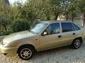 2011 Daewoo Nexia I Рестайлинг, бежевый - вид 1
