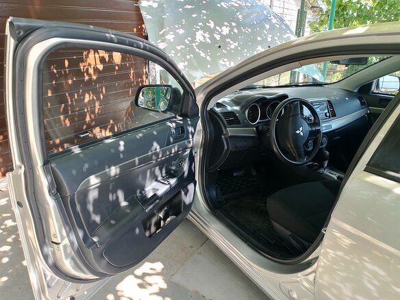 2014 Mitsubishi Lancer X Рестайлинг, серебристый, 870000 рублей - вид 12