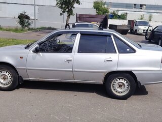 2011 Daewoo Nexia I Рестайлинг, серебристый, 195000 рублей, вид 3