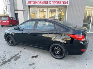 2011 Hyundai Solaris I, чёрный, 693000 рублей, вид 2