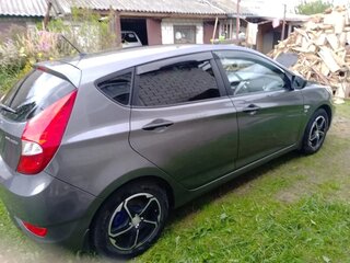 2013 Hyundai Solaris I, коричневый, 865000 рублей, вид 2