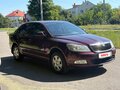 2010 Skoda Octavia II (A5) Рестайлинг, пурпурный, 850000 рублей - вид 3
