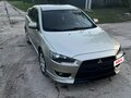 2007 Mitsubishi Lancer X, бежевый, 720000 рублей - вид 2