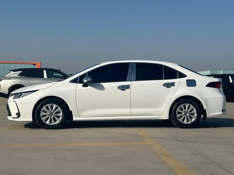 2021 Toyota Corolla XII (E210), белый, 1846000 рублей, вид 2