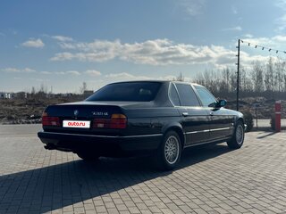 1990 BMW 7 серии 735i II (E32), чёрный, 850000 рублей, вид 4
