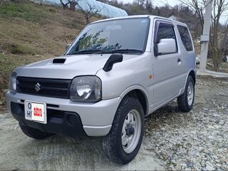 2011 Suzuki Jimny Kei car III Рестайлинг 1, серебристый, 1050000 рублей, вид 2