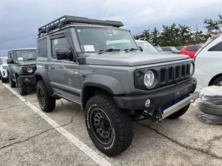 2022 Suzuki Jimny Sierra IV, серый, 1546911 рублей, вид 1