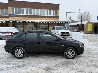2010 Mitsubishi Lancer X, чёрный, 1050000 рублей, вид 1