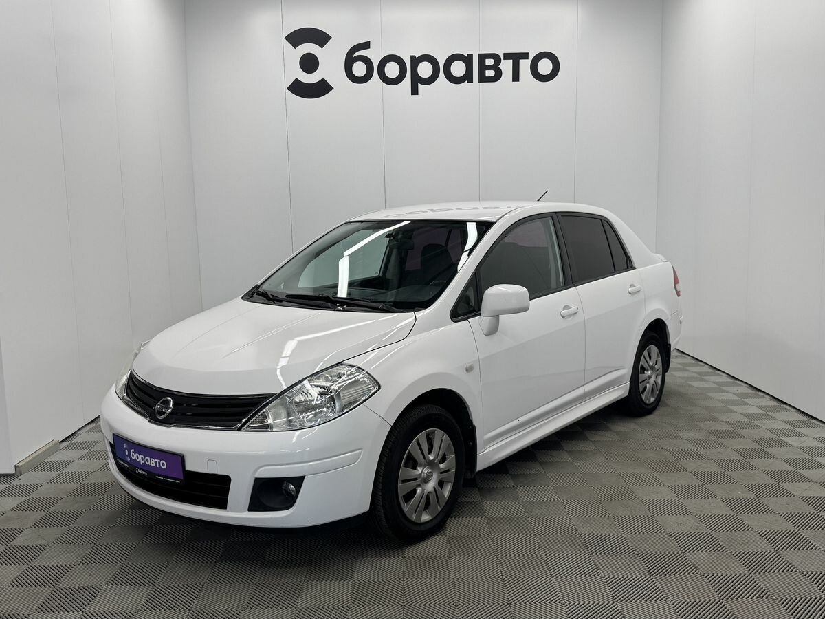 Открыть фотографии: Nissan Tiida I Рестайлинг
