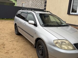 2004 Toyota Corolla IX (E120, E130), серебристый, 450000 рублей, вид 2