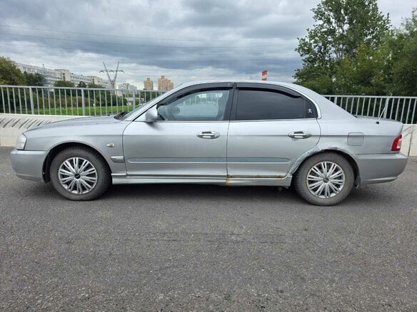 2006 Kia Magentis I Рестайлинг, серебристый, 210000 рублей - вид 3