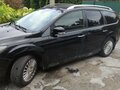 2010 Ford Focus II Рестайлинг, чёрный, 410000 рублей - вид 2