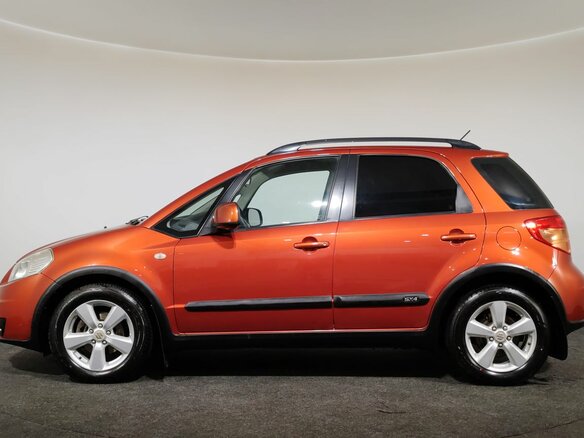 2010 Suzuki SX4 I (Classic) Рестайлинг, оранжевый, 750000 рублей - вид 7