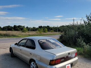 1992 Toyota Sprinter VII (E100), коричневый, 300000 рублей, вид 3