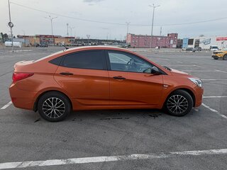 2015 Hyundai Solaris I Рестайлинг, оранжевый, 930000 рублей, вид 3