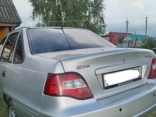 2011 Daewoo Nexia I Рестайлинг, серебристый, 185000 рублей, вид 3