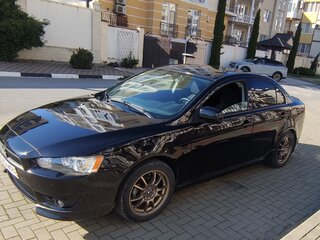 2008 Mitsubishi Lancer X, чёрный, 750000 рублей, вид 2