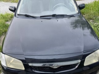 1999 Mazda 323 VI (BJ), чёрный, 260000 рублей, вид 1