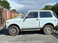 2010 Lada (ВАЗ) 2121 (4x4) I Рестайлинг, белый, 650000 рублей - вид 2