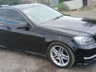 2011 Mercedes-Benz C-Класс 180 BlueEFFICIENCY III (W204) Рестайлинг, чёрный, 1290000 рублей, вид 1