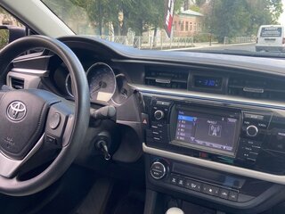 2016 Toyota Corolla XI (E160, E170, E180), серый, 1099000 рублей, вид 3