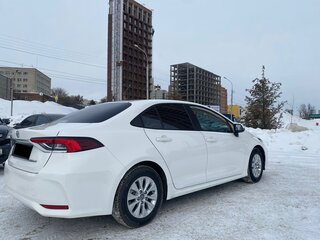 2021 Toyota Corolla XII (E210), белый, 1950000 рублей, вид 2