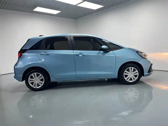 2023 Honda Fit Crosstar IV Рестайлинг, голубой - вид 4
