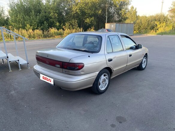 1998 Kia Sephia I Рестайлинг, бежевый, 100000 рублей - вид 2