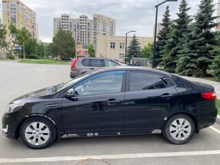 2012 Kia Rio 4-speed III, чёрный, 730000 рублей, вид 4