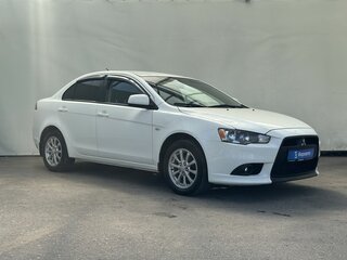 2011 Mitsubishi Lancer X Рестайлинг, белый, 799000 рублей, вид 2