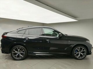 2021 BMW X6 40d III (G06), чёрный, 7500000 рублей, вид 4