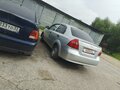 2011 Chevrolet Aveo I Рестайлинг, серебристый, 560000 рублей - вид 5