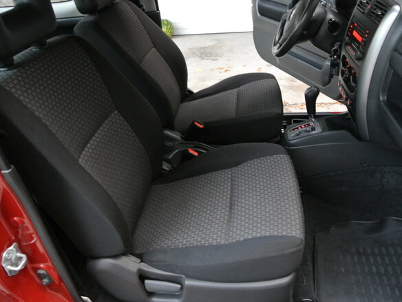 2011 Suzuki Jimny III Рестайлинг 1, красный - вид 1