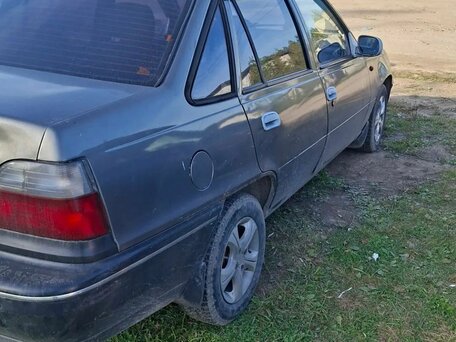 2001 Daewoo Nexia I, коричневый, 90000 рублей, вид 4