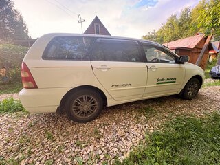 2001 Toyota Corolla Fielder IX (E120, E130), белый, 599000 рублей, вид 4