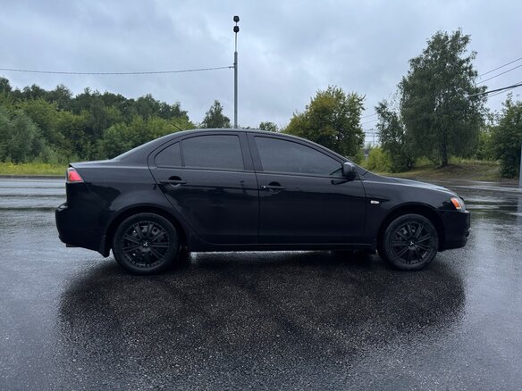 2010 Mitsubishi Lancer X, чёрный, 685000 рублей - вид 7