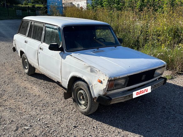 1999 Lada (ВАЗ) 2104 4-speed, белый - вид 1