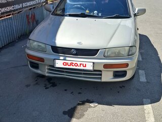 1995 Mazda Familia VII (BH), золотистый, 155000 рублей, вид 2