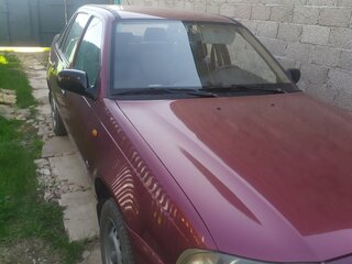 2010 Daewoo Nexia I Рестайлинг, пурпурный, 260000 рублей, вид 2