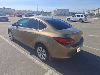 2014 Opel Astra J Рестайлинг, золотистый, 990000 рублей, вид 2