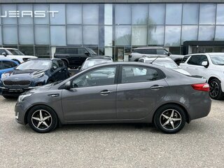 2012 Kia Rio 4-speed III, серый, 849000 рублей, вид 4