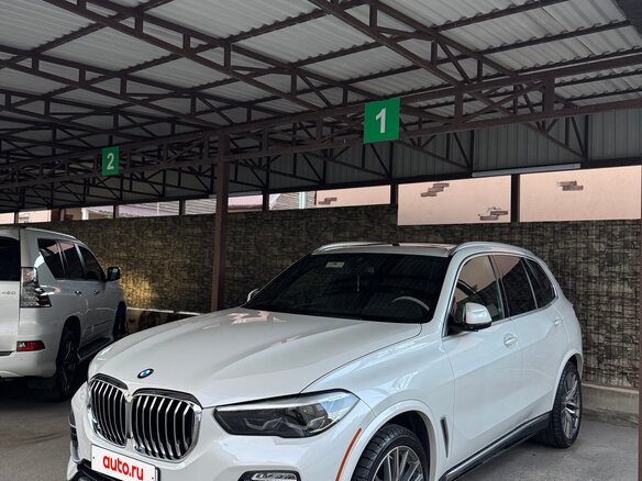 2019 BMW X5 40i IV (G05/G18), белый, 6250000 рублей - вид 1