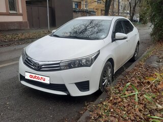 2014 Toyota Corolla XI (E160, E170, E180), белый, 1300000 рублей, вид 2