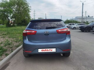 2014 Kia Rio 6-speed III, голубой, 645000 рублей, вид 5