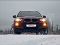 2010 BMW X5 30i II (E70), красный, 1750000 рублей - вид 2